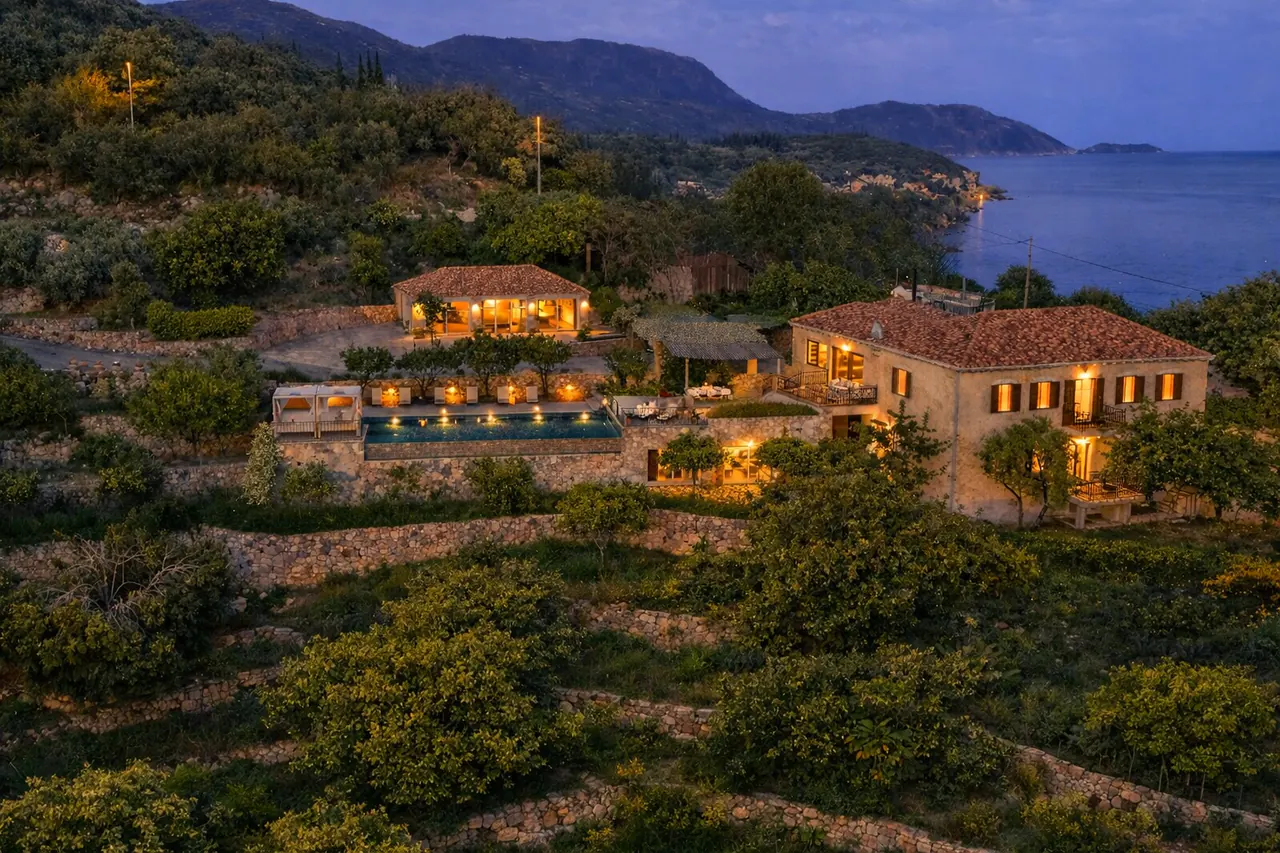 Molonta Heritage Estate illuminated above the Adriatic at twilight